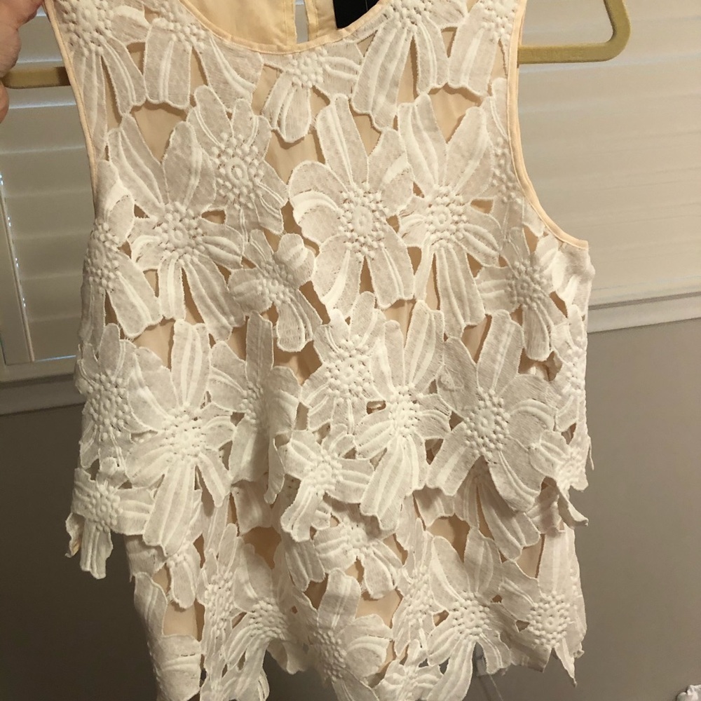 Sleeveless White Top with Floral overlay
